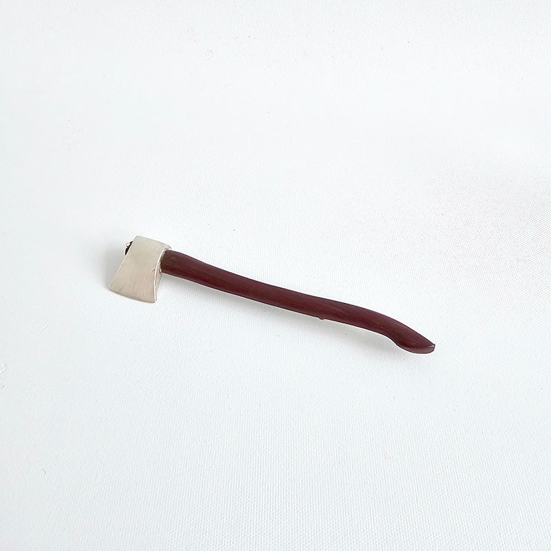 Axe brooch