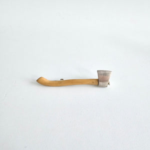 Axe brooch
