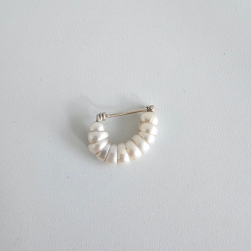 Huhu brooch