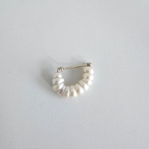 Huhu brooch