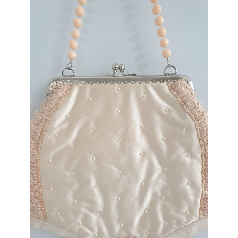 Handbag: Her first purse, 2019