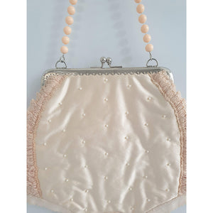 Handbag: Her first purse, 2019