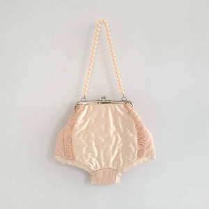 Handbag: Her first purse, 2019