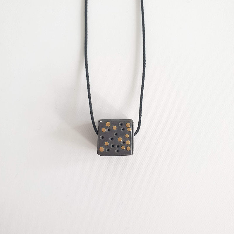 Holey Cube pendant